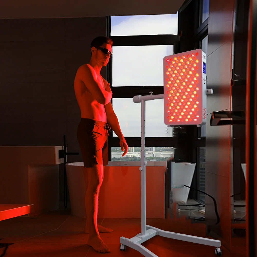 Person using the RL120MAX red light therapy panel