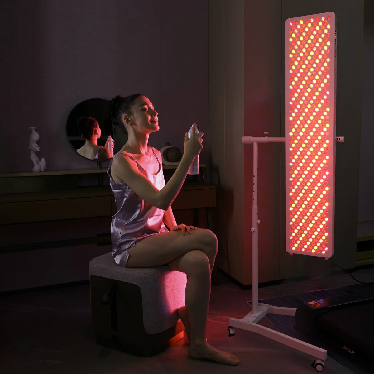 Person using the RL450MAX red light therapy panel