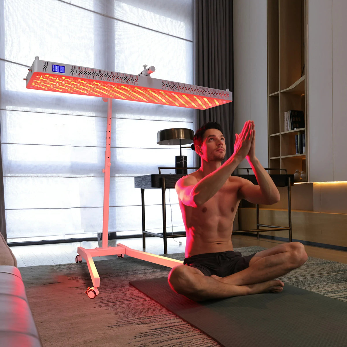 Person using the RL450MAX red light therapy panel